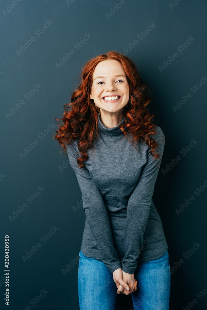 Portrait of cheerful young red-haired woman Portrait of cheerful young red-haired woman