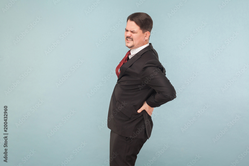 Businessman have kidney, lower back or hernia pain Businessman have kidney, lower back or hernia pain