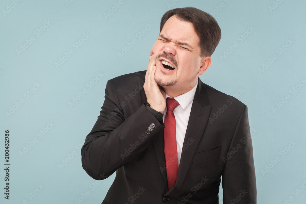 Bad feelings concept. Businessman have toothy dental pain Bad feelings concept. Businessman have toothy dental pain