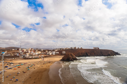 Breathtaking view on Atlantic ocean beach in small Morrocan town Iguer Ouzrou