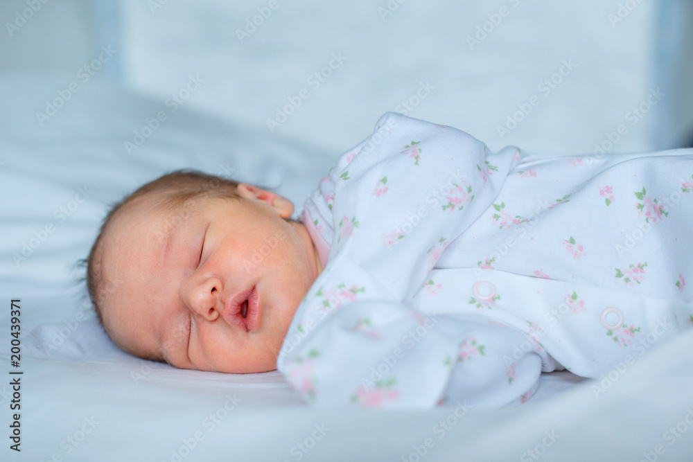 Portrait of newborn baby girl sleeping at home Portrait of newborn baby girl sleeping at home