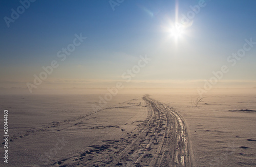 The winter road that goes to the horizon