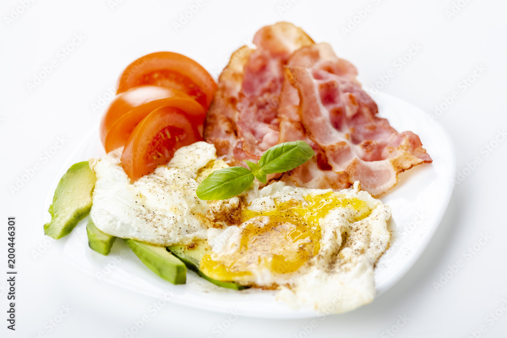 bacon and eggs with avocado and tomato, bread and coffee bacon and eggs with avocado and tomato, bread and coffee