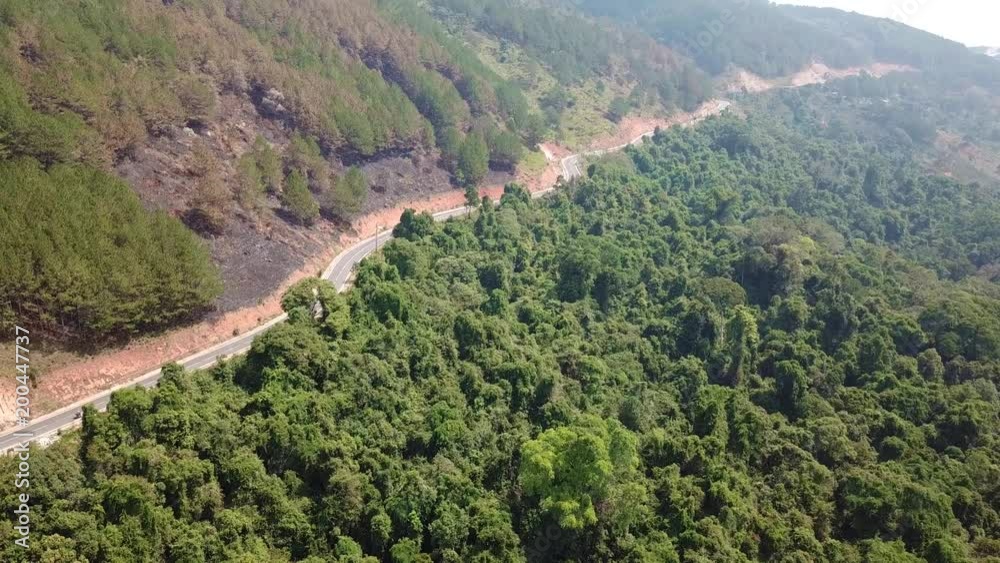 Top view. Aerial view from drone. Royalty high quality free stock image of road in forest. Road in forest is beautiful with many tree, road on pass very winding and curve
Top view. Aerial view from drone. Royalty high quality free stock image of road in forest. Road in forest is beautiful with many tree, road on pass very winding and curve