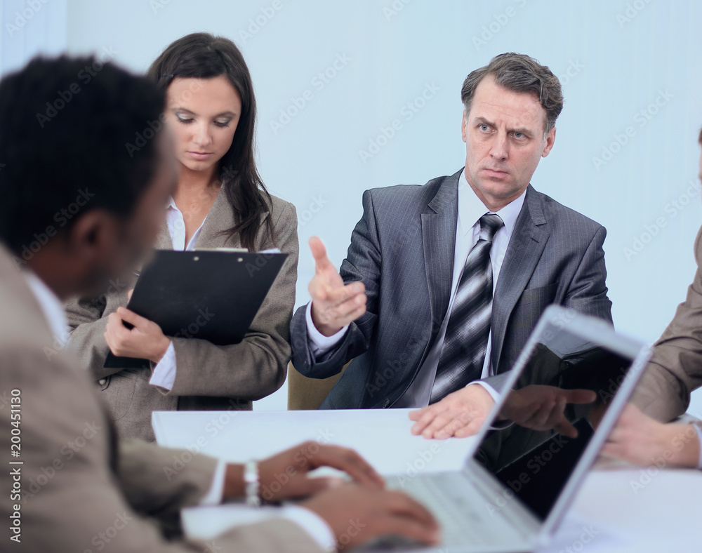 businessman holds working meeting with employees