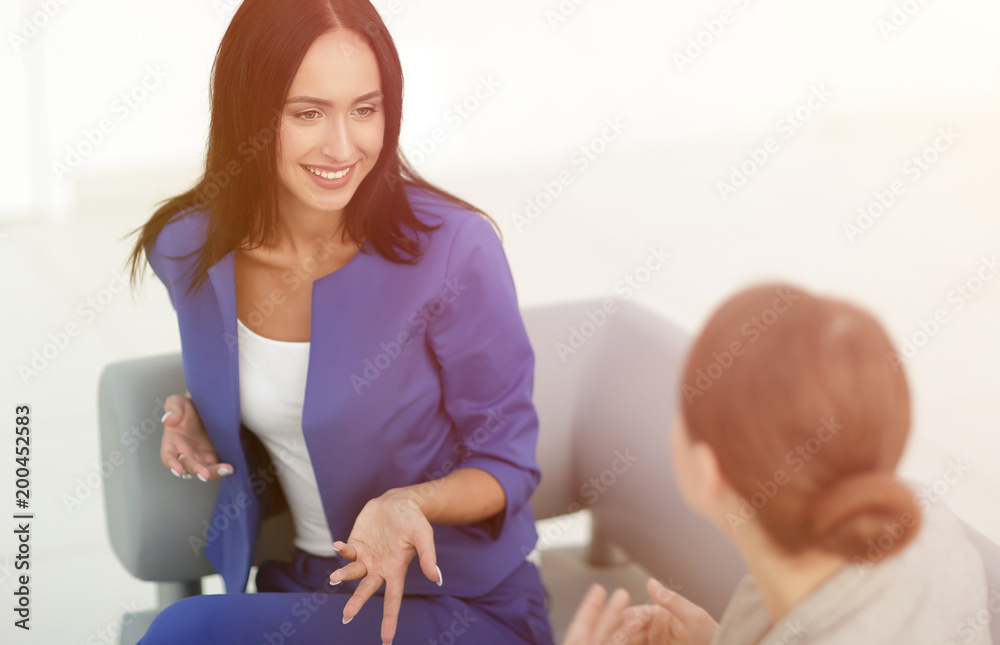 attractive business women meet in the office during a break attractive business women meet in the office during a break