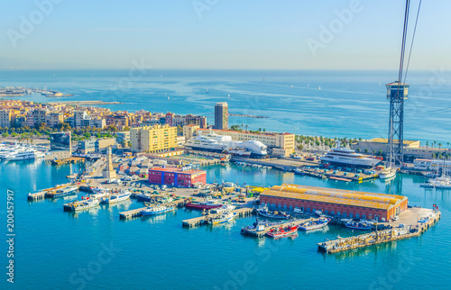 View of port of Barcelona dominated by torre del rellotge photo