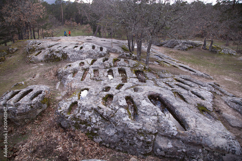 Necropolis De Revenga in quintanar de la sierra in spain burgos, are tombs carved in stone photo