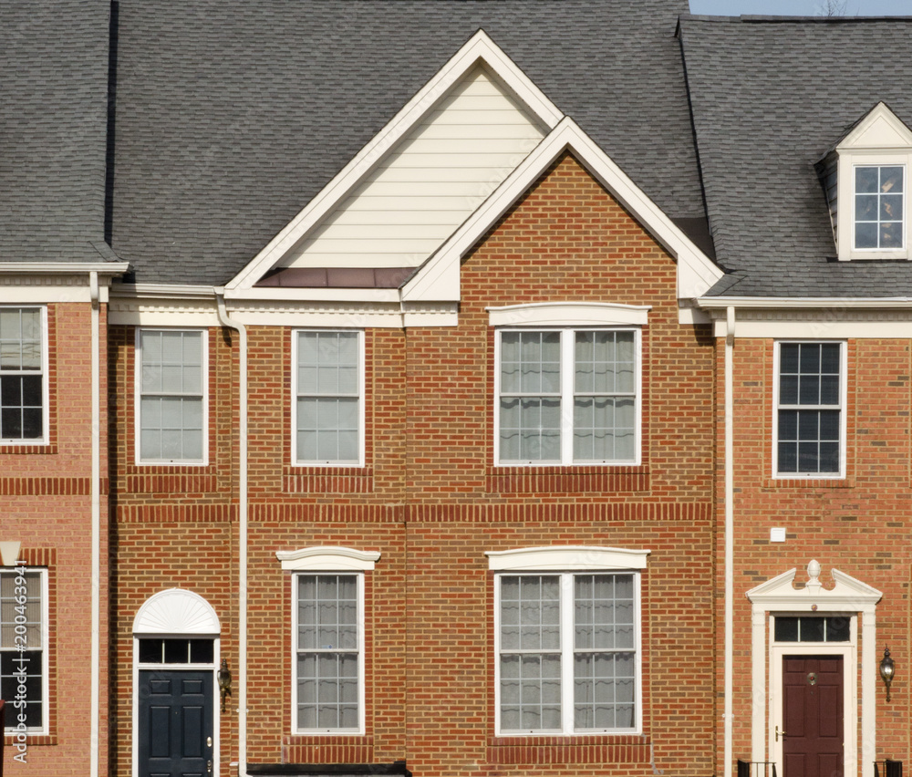 Front elevation of a house with windows and door