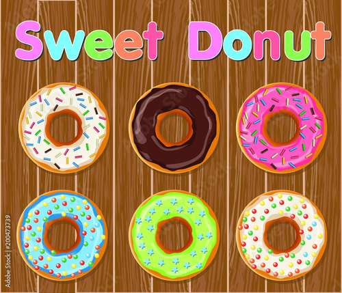 Delicious sweet donuts on old wood background