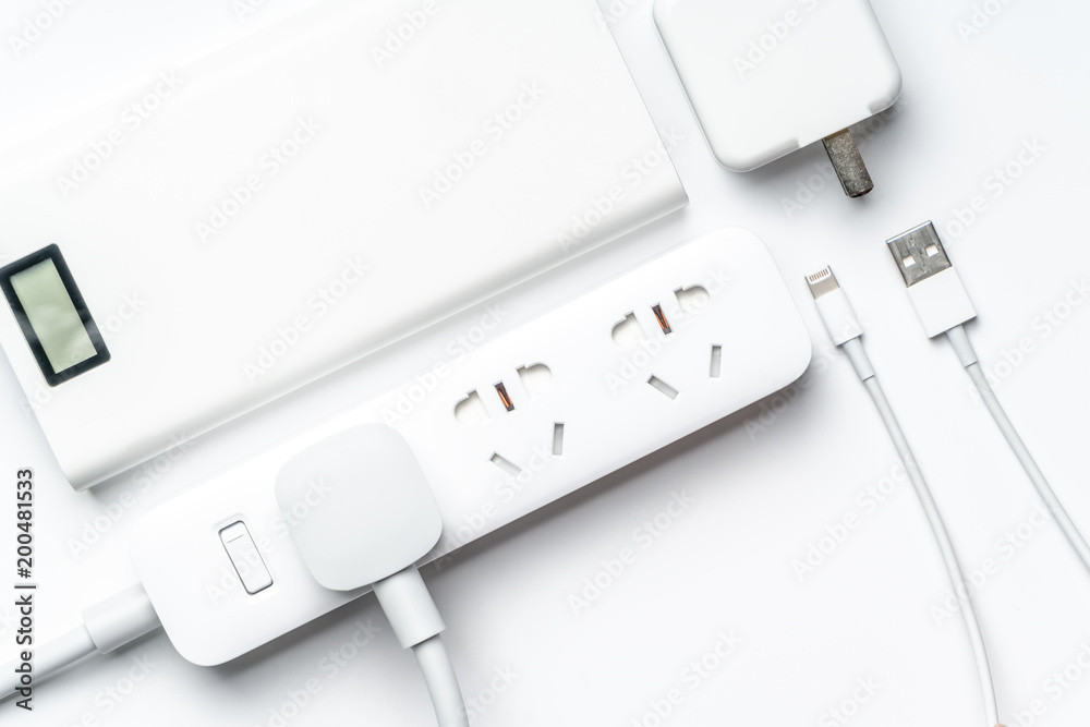 socket plug electric power bank and wire white color isolate. save energy and reduce energy efficiency concept socket plug electric power bank and wire white color isolate. save energy and reduce energy efficiency concept