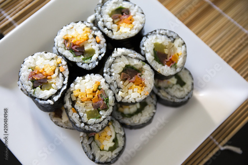 Kimbap filled with vegetables, egg and ham
