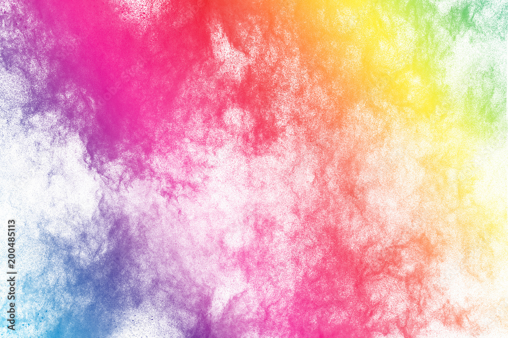 Abstract  colored dust explosion on white background.Abstract color powder splattered background