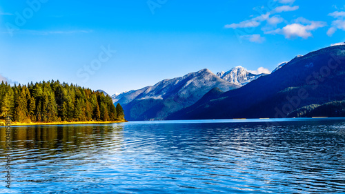 Pitt Lake with the Snow Capped Peaks of the Golden Ears, Tingle Peak and other Mountain Peaks of the surrounding Coast Mountain Range in the Fraser Valley of British Columbia, Canada photo