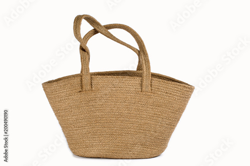 Close Up Of A Large Natural Plant Fibre Jute Burlap Bags Eco-Friendly & Reusable In Natural Brown Color Handles Isolated On White Background