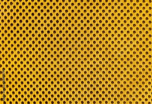 yellow breathable porous poriferous material for air ventilation with holes