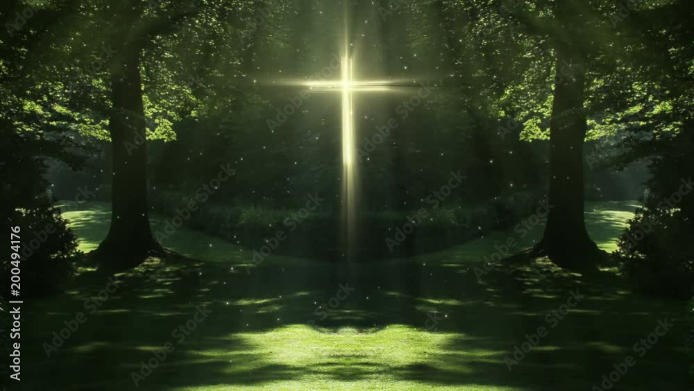 Glowing holy christian cross in nature scenery
