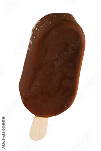 Ice cream in chocolate glaze on a wooden stick. Sweet dessert for the summer is photographed close-up. Isolated on white background.