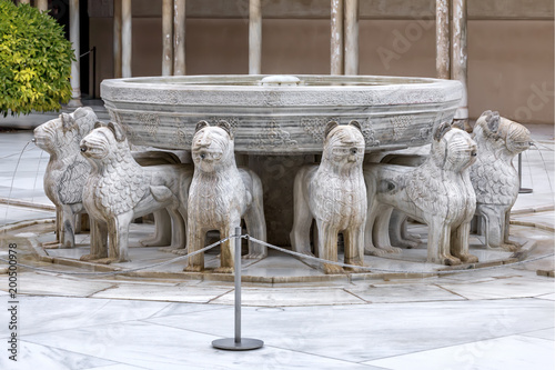 Patio of the Lions is a famous courtyard in the middle of the Lion Palace of the Nasrid dynasty in the Alhambra residence.
