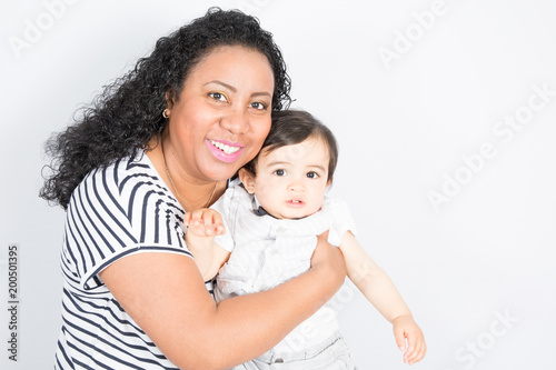 black mother with son mixed race smiling