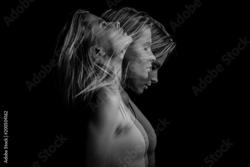 Fotografia Beautiful dramatic phantom mystical mysterious ambiguous original conceptual profile side portrait of young blonde woman on a black background