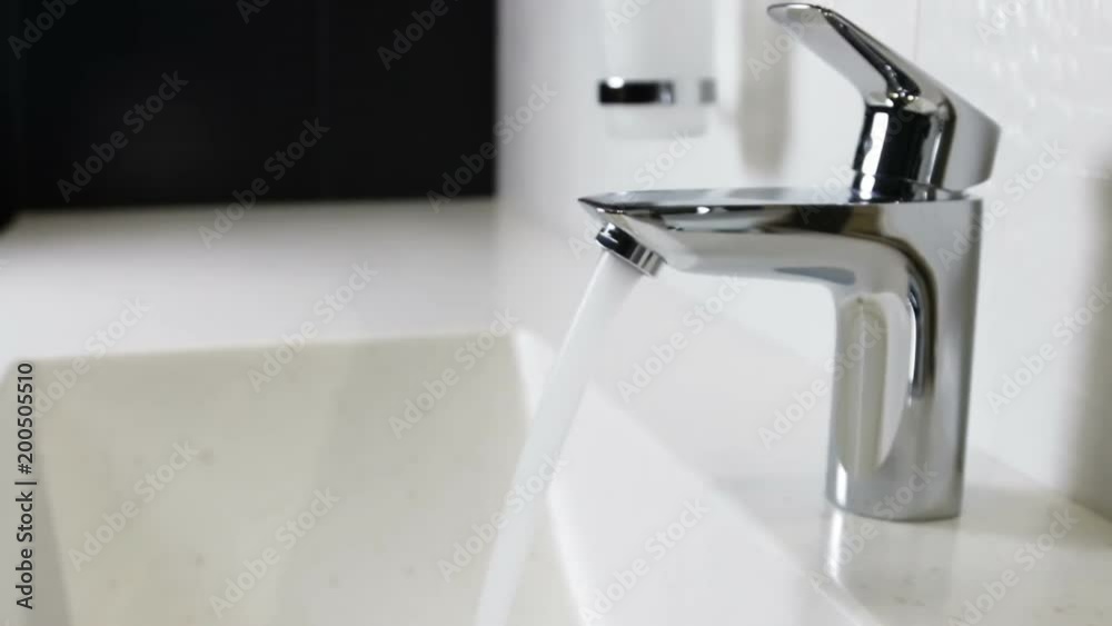 water faucet in a luxurious hotel room or at home in the bathroom. Slider video water faucet in a luxurious hotel room or at home in the bathroom. Slider video