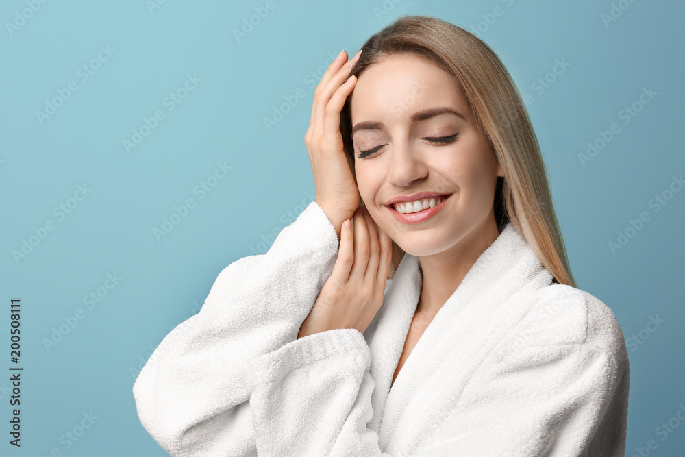 Beautiful young woman with silky skin on color background Beautiful young woman with silky skin on color background