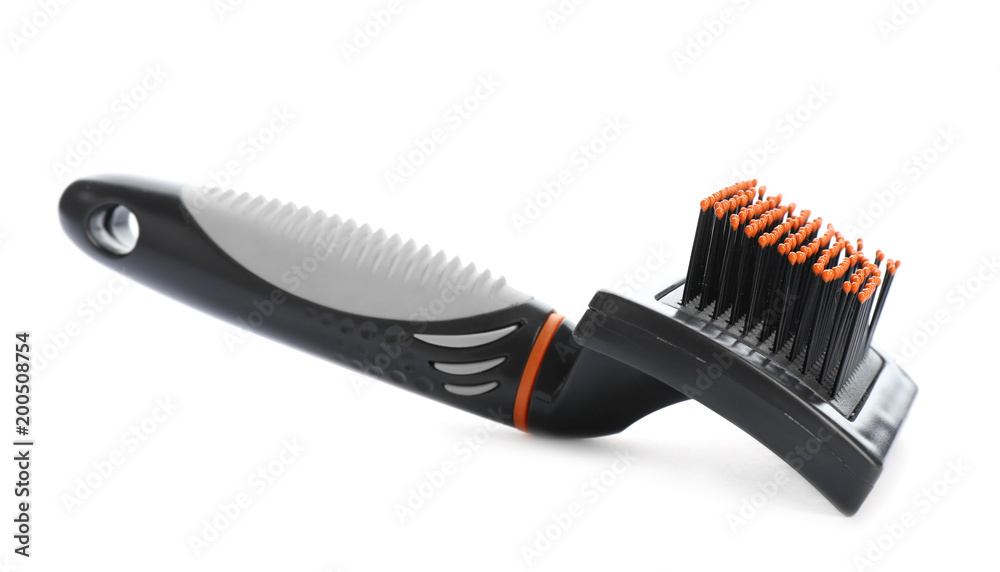 Brush for cat on white background. Pet care Brush for cat on white background. Pet care