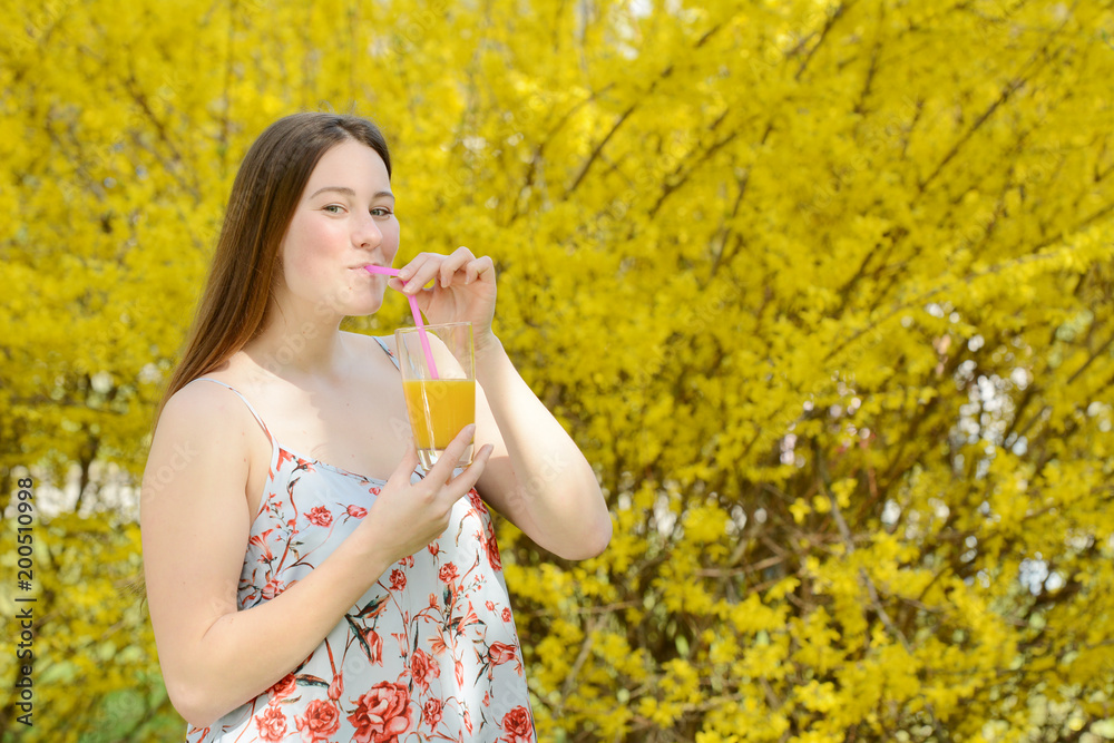 Beautiful attractive young woman holding healthy detox vegetable. Healthy lifestyle concept. Beautiful attractive young woman holding healthy detox vegetable. Healthy lifestyle concept.