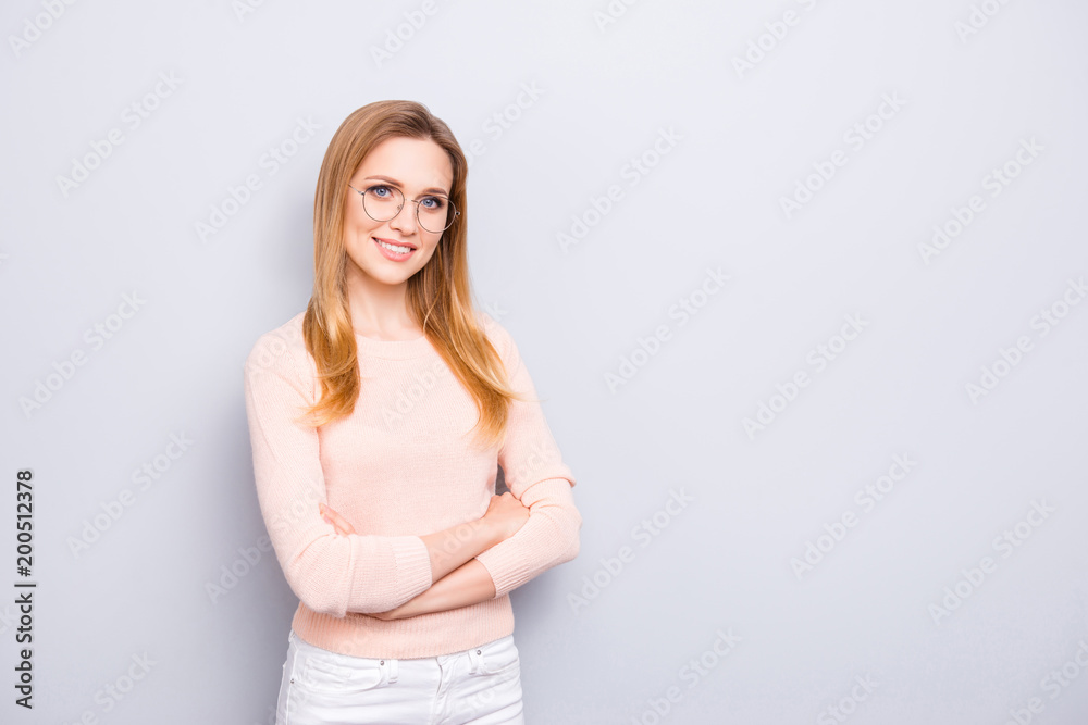 Portrait of pretty intelligent cute lovely charming confident experienced qualified stunning lady wearing old-fashioned glasses wearing pullover white trousers isolated on gray background copyspace Portrait of pretty intelligent cute lovely charming confident experienced qualified stunning lady wearing old-fashioned glasses wearing pullover white trousers isolated on gray background copyspace