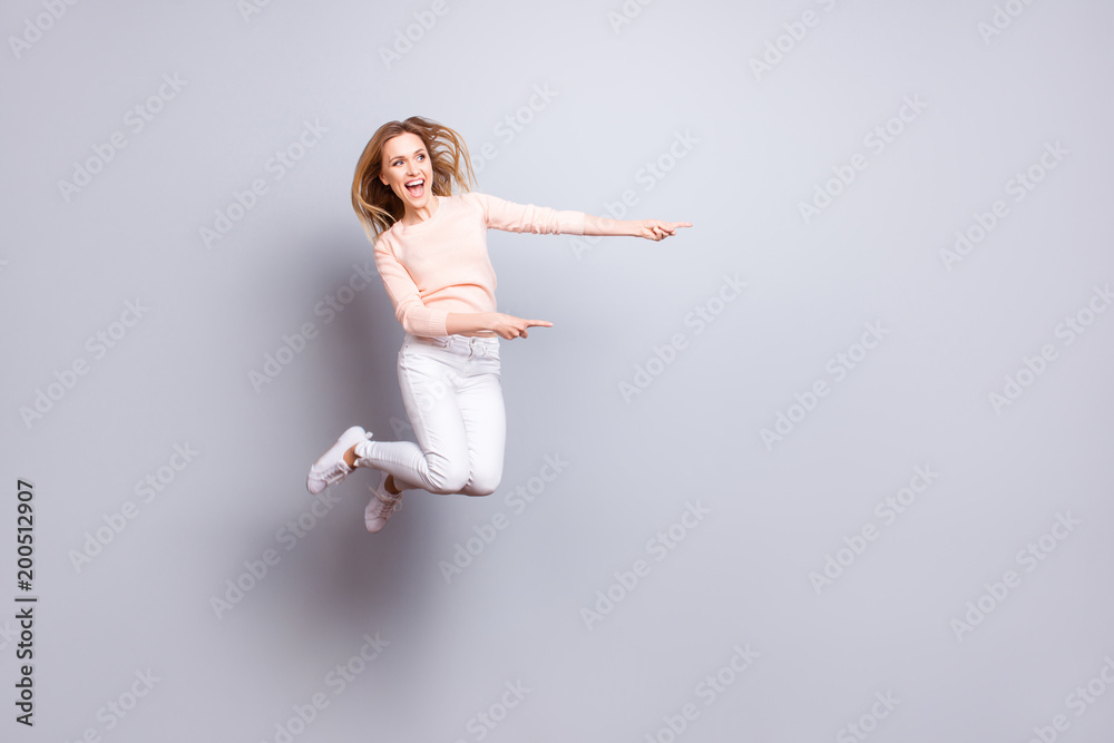Fototapeta premium Choose choice look attention scream laugh entertainment people business person concept. Full-length full-size excited cheerful careless girl demonstrating empty place isolated on gray background