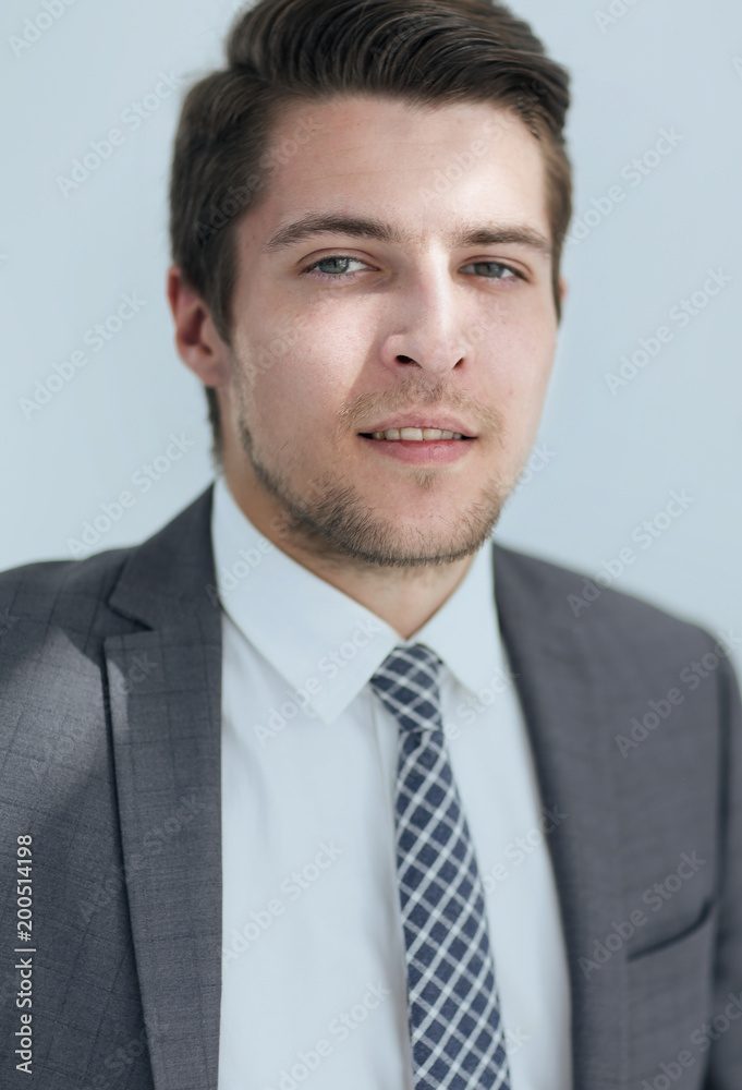 closeup.the face of a successful young man