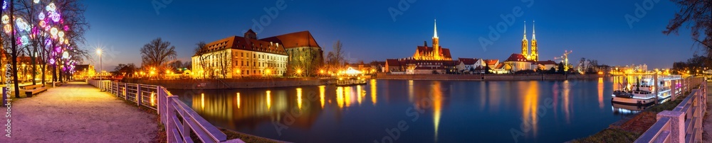 Cityscape, evening panorama - view on the embankment river Odra of the city Wroclaw and its old district Ostrow Tumski, Lower Silesia Province, The Poland
