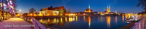 Cityscape  evening panorama - view on the embankment river Odra of the city Wroclaw and its old district Ostrow Tumski  Lower Silesia Province  The Poland