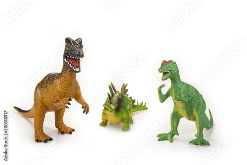 Fototapeta Naklejka Na Ścianę i Meble -  Dinosaur toy with open mouth on the white