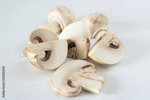 White champignons isolated. Fresh beautiful mushrooms