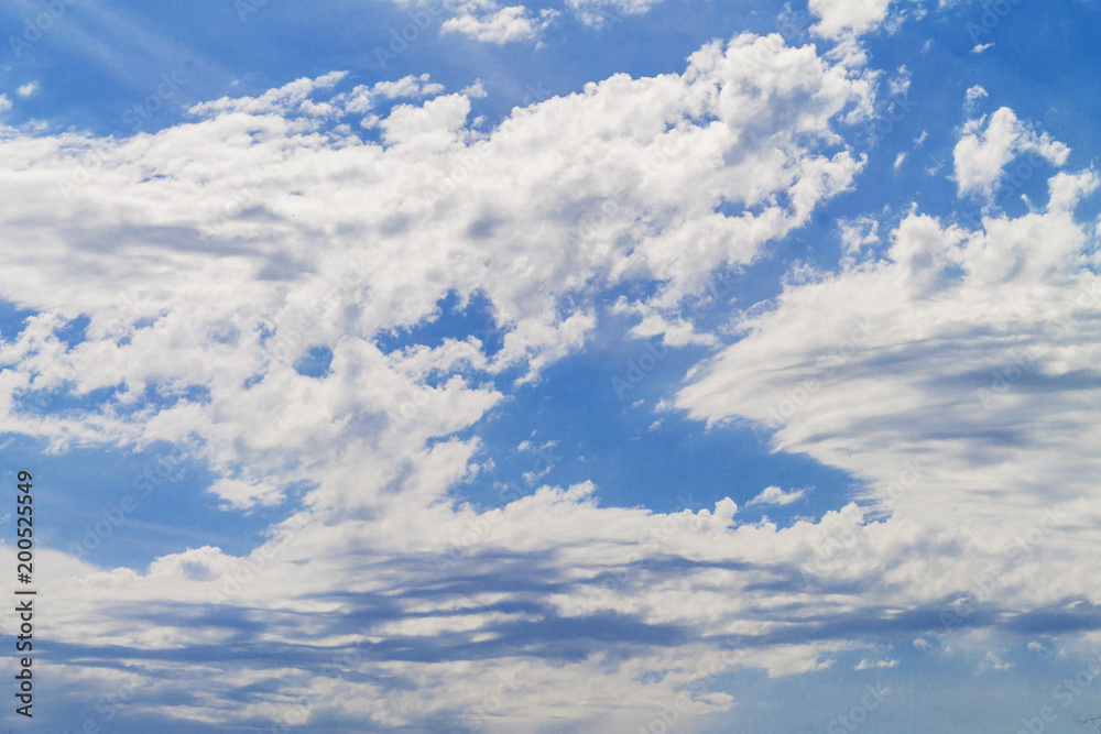 Fluffy white clouds on blue sky Fluffy white clouds on blue sky