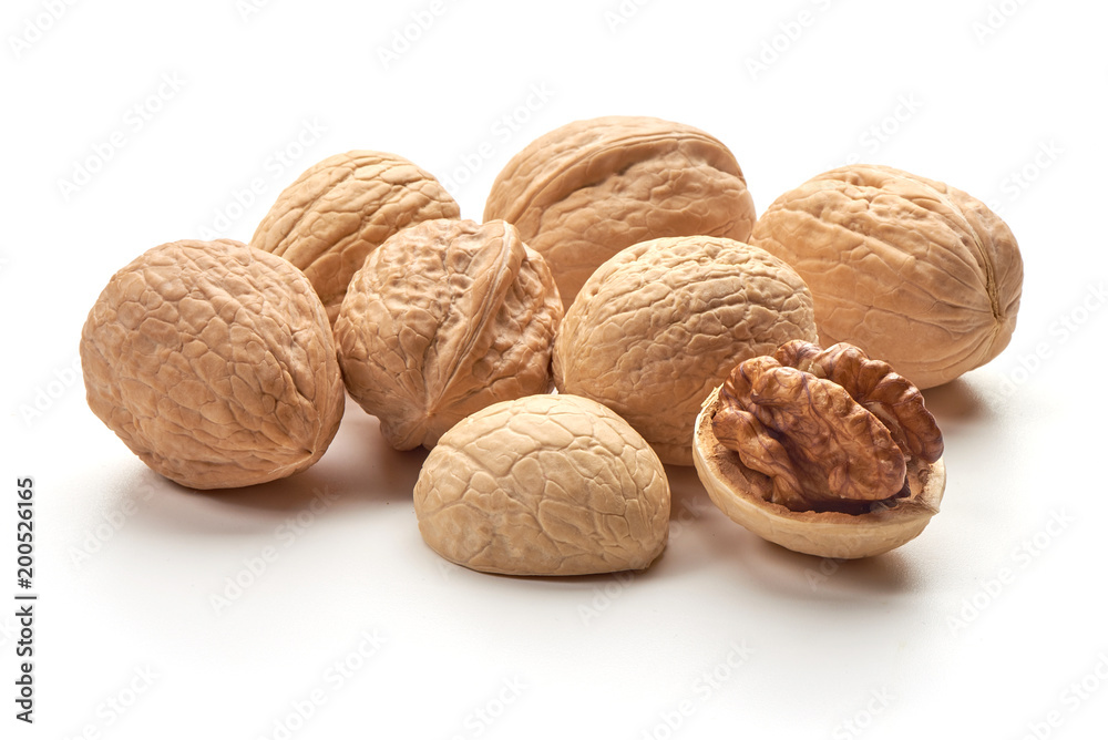 Useful walnuts, close-up, isolated on white background. Useful walnuts, close-up, isolated on white background.