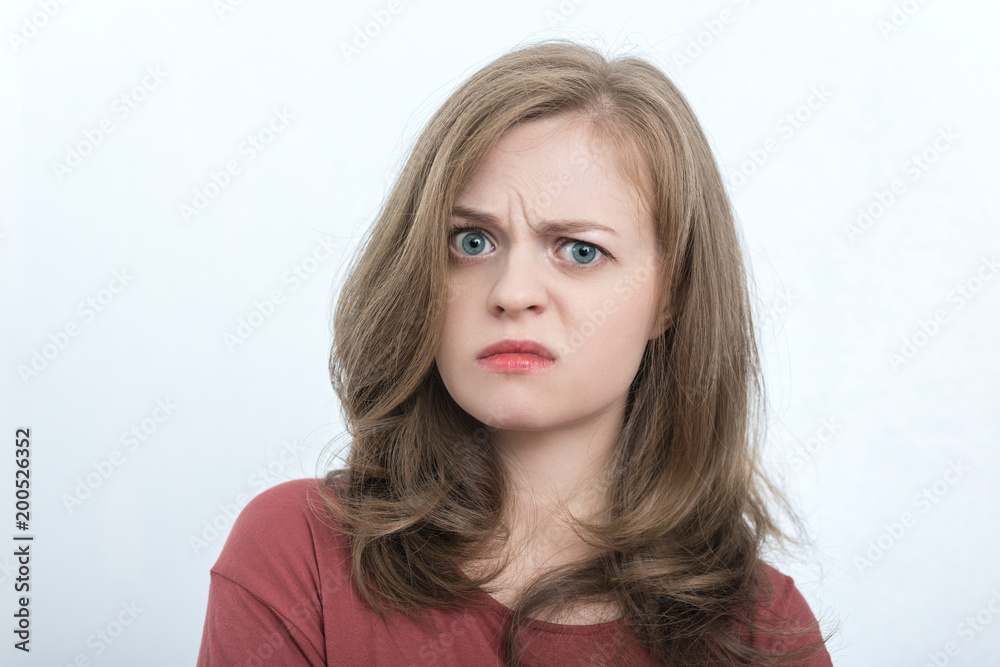 Caucasian girl surprised, shocked, puzzled, bewildered Caucasian girl surprised, shocked, puzzled, bewildered