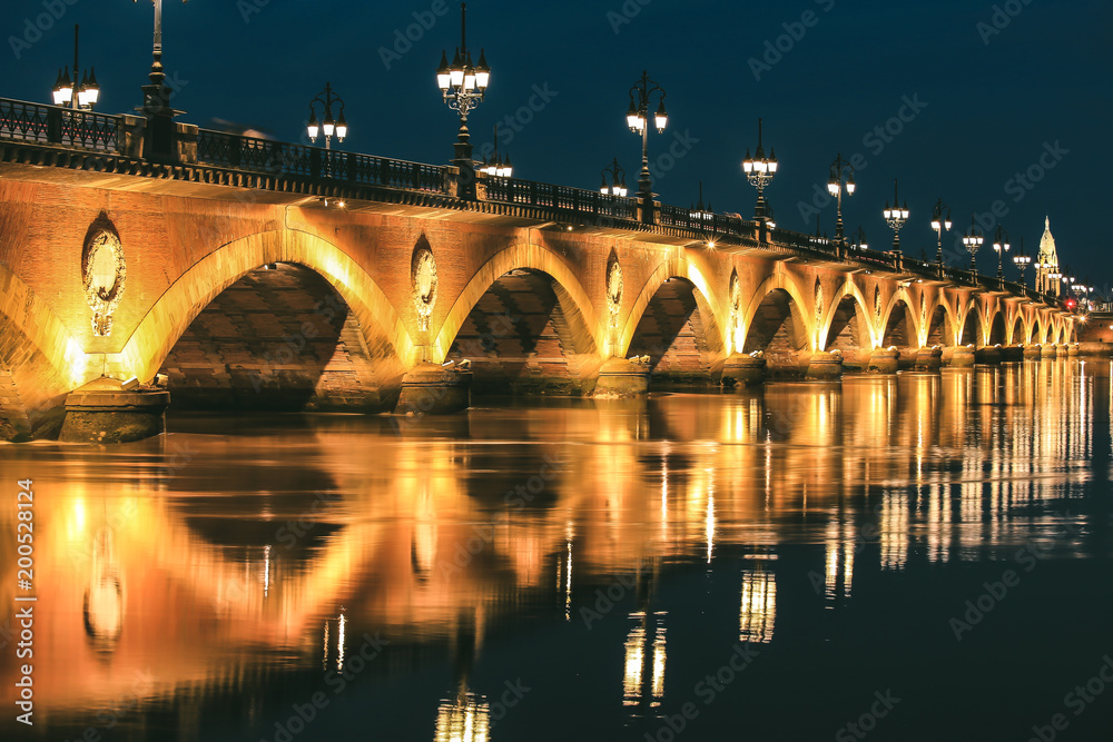 Twilight at Pont de Pierre bridge in Bordeaux, France	