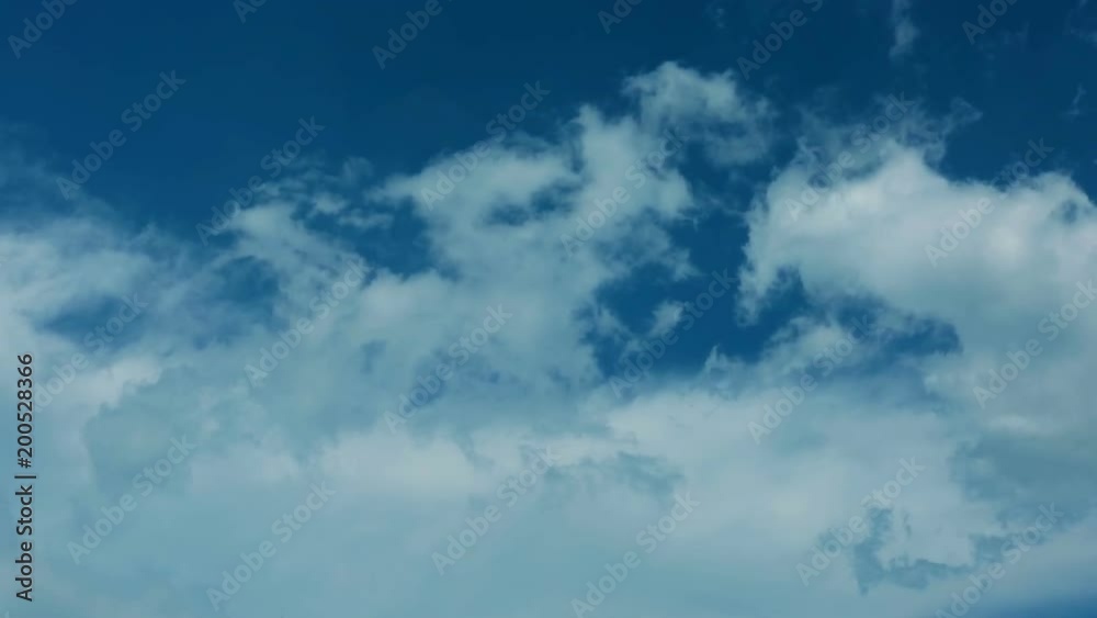 White Clouds and Blue Sky time-lapse. Beautiful cloudscape.