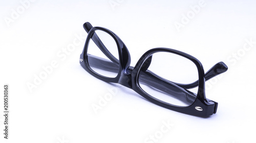 Closeup of glasses or spectacles isolated on white background. Selective focus.