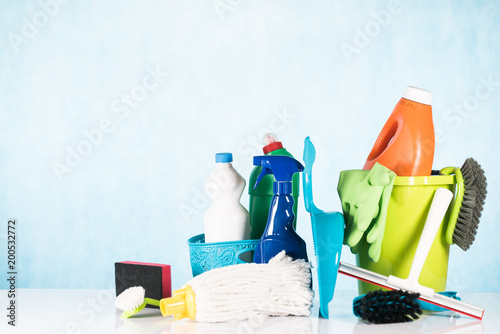 Colorful Cleaning Products on blue background