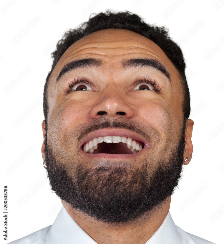 Fototapeta premium Close up portrait of a black man expressing surprise isolated on white background