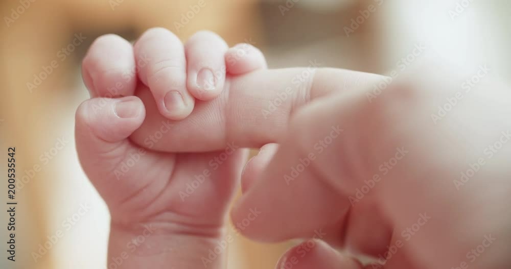 4k ,Parent holding newborns hand in Slow Motion. Happy Family Mother and her Newborn Baby together. Maternity concept. Parenthood. Motherhood 4k ,Parent holding newborns hand in Slow Motion. Happy Family Mother and her Newborn Baby together. Maternity concept. Parenthood. Motherhood