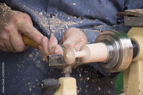 Carpenter with workpiece in carpentry