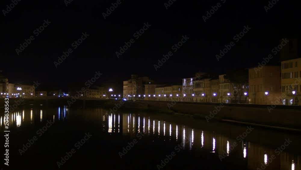 The Arno River seen at night in Pisa The Arno River seen at night in Pisa
