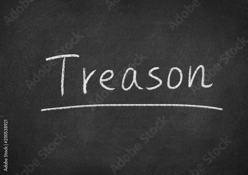 treason concept word on a blackboard background