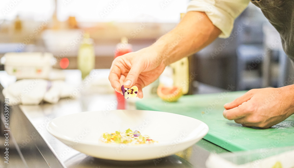 Chef prepare fish tartare in five stars hotel for dinner