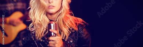Portrait of female singer with blond hair